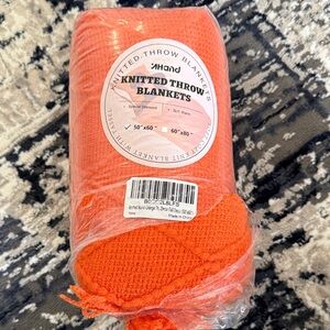 AND Knitted Orange Throw Blanket